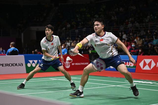 官网入口-国羽男单男双携手挺进四强 “梁王”组合成未来之星